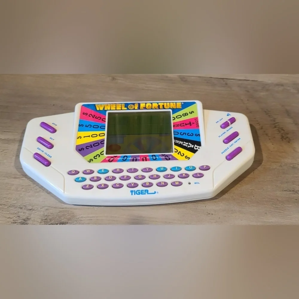 Vintage Wheel of Fortune Handheld Game 1995 Tiger Electronics [ Read Details ]